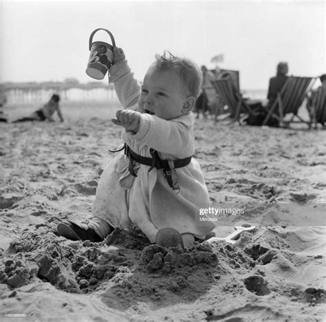 Twelve Month Old Alison Smith Enjoying The Pleasures Of The Beach For