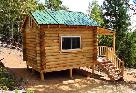 Hanging on the walls are sliding barn doors that provide entry into the bedroom and closets. Small Log Cabin Kits Pre-Built Log Cabins, small log cabin ...