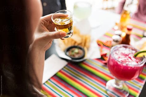 Cinco Woman Ready To Drink Tequila Shot Del Colaborador De Stocksy Sean Locke Stocksy