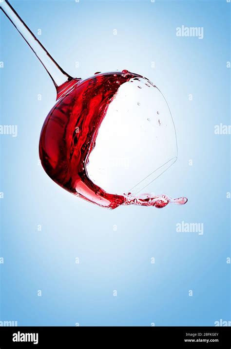 Falling Glass Of Red Wine Stock Photo Alamy