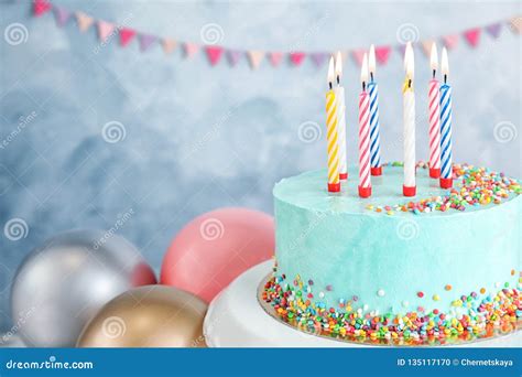 Fresh Delicious Birthday Cake With Candles Near Balloons On Color