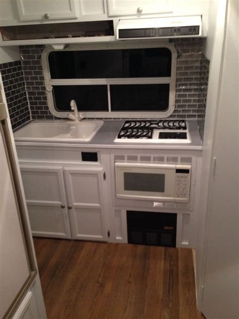 Feb 23, 2021 · the nestbox camper is one of egoe's smallest offerings, built for suvs and offers a bed platform, outdoor kitchen, storage space and cooler. Remodeled camper kitchen. | Camper interior design ...