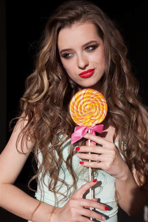 Pretty Girl Eats Sweet Candy Lollipop Candy Stock Photo Image Of Excited Beauty