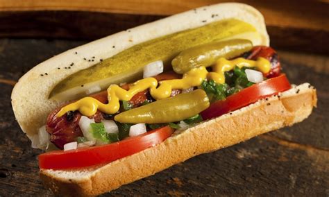 Tater tots and sausage with pizza sauce and melted cheese. Hot Dogs and Loaded Tater Tots - Doghouse | Groupon