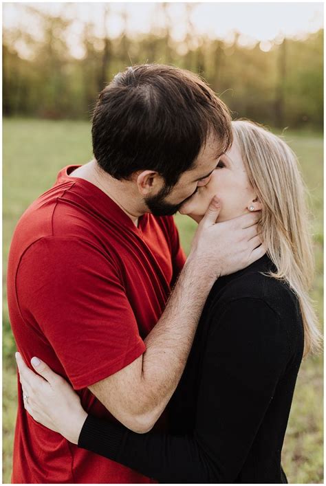 Couple Pose Kissing With Hand On Cheek Kayla Tison Photography