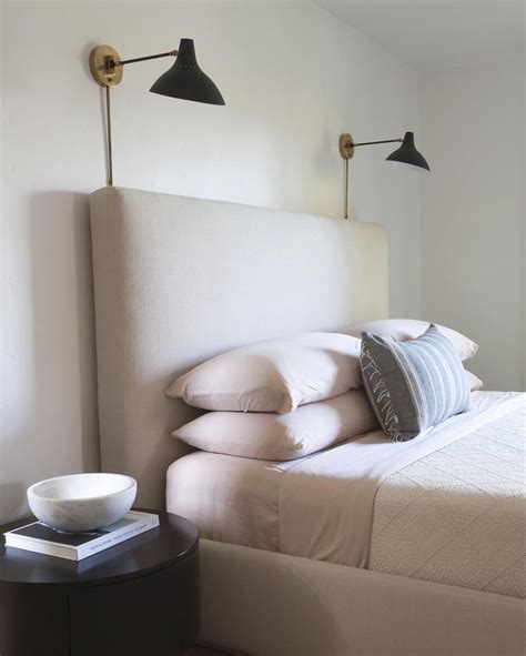 From adding a layer of flattering ambient light, compensating for where the overhead lighting doesn't reach or isn't an option. master bedroom inspiration. sconces above headboard ...