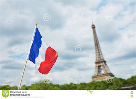 French National Flag Tricolour In Paris With The Eiffel Tower In The
