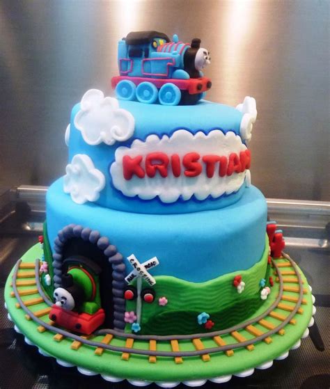 A Thomas The Train Birthday Cake Is On Display