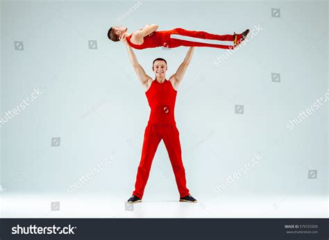 Two Gymnastic Acrobatic Caucasian Men On Stock Photo 579725509