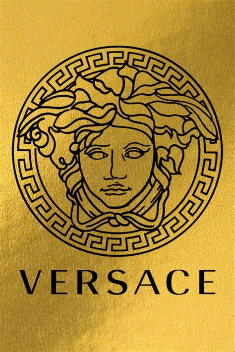 The Versa Logo Is Shown In Black And Gold On A Golden Background With