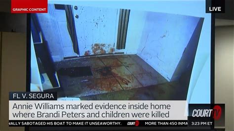 Crime scene with dramatic lighting. COURT TV - GRAPHIC CONTENT: Jury sees bloody photos from ...