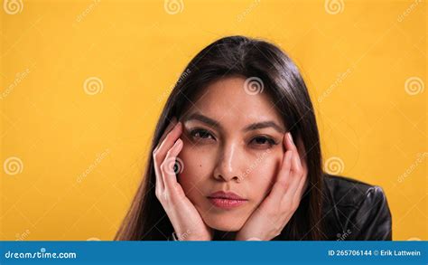 Young Woman With A Pretty Face Poses For The Camera Stock Photo Image