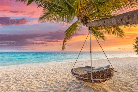 Tropical sunset beach and sky background as exotic summer landscape