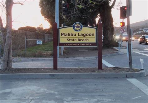 There Is A Sign On The Side Of The Street That Says Mabibu Lagoon State