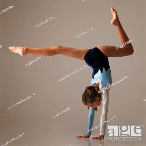 Female Gymnast 12 13 Performing Handstand Stock Photo Picture And
