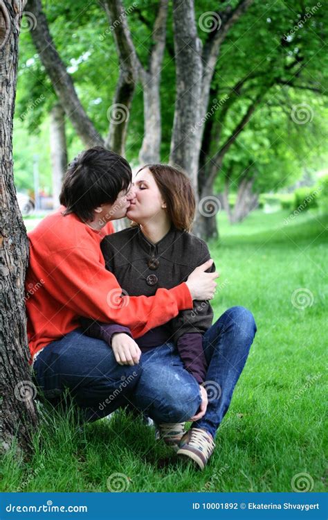 Couple Kissing Under A Tree Stock Photography Image 10001892