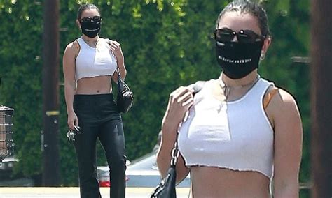 Charli Xcx Flaunts Her Toned Abs In A White Crop Top As Stocks Up On Groceries In Los Angeles