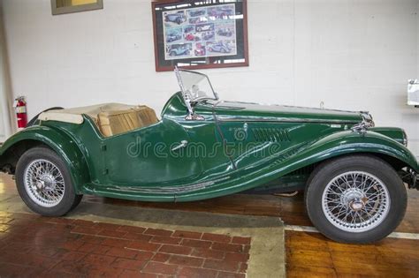 A Green 1955 Mg Tf 1500 Car At Lane Motor Museum With The Largest