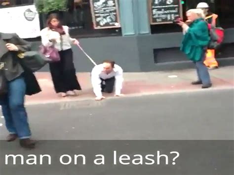 فيديو امرأة مستبدة تسحب رجلاً بسلسلة من عنقه وتتجول به في شوار