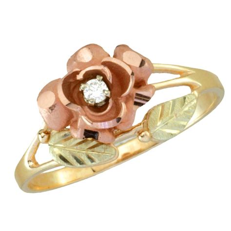 This ring is made up of 10k black hills gold and features a rose design with accented leaves. Coleman Black Hills Gold Diamond Rose Ring For Ladies - BlackHillsGold.Direct - Klugex