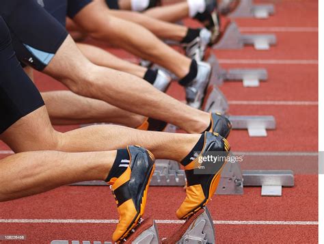 Runners On Starting Blocks High-Res Stock Photo - Getty Images
