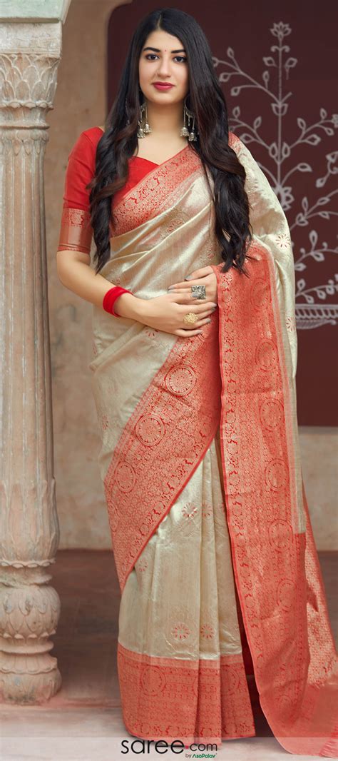 Cream Banarasi Silk Traditional Woven Saree With Red Border And Pallu