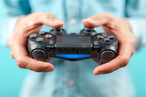 Male Hands Holding A Ps4 Controller Editorial Photography Image Of