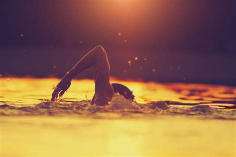 Shutterstock Swimming Sunrise Reaching Ahead Counseling And Mental
