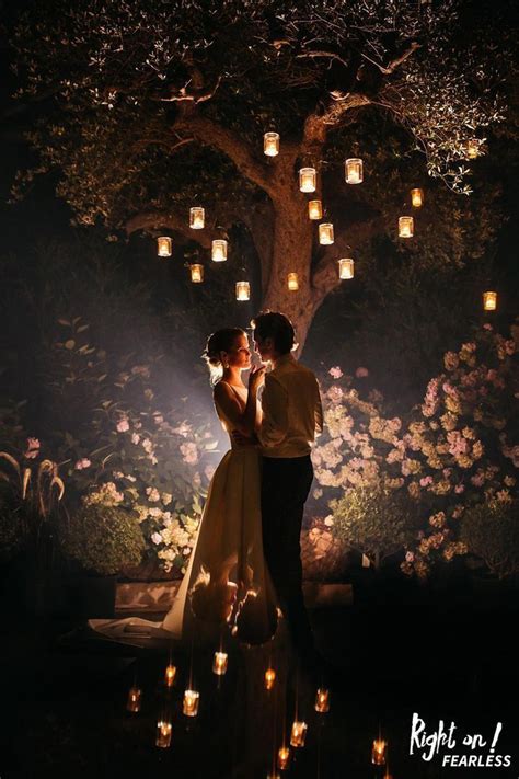 Nighttime Fairytale Wedding Portrait Under A Tree With Candles And
