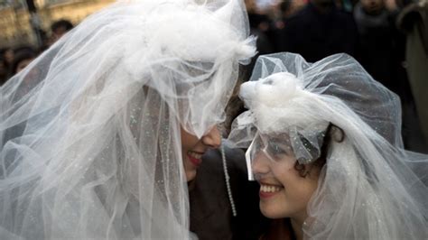 hollande signs france s gay marriage bill