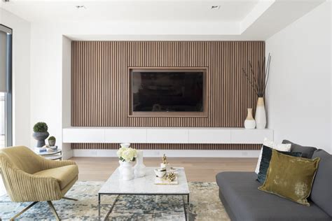 Design Detail A Wood Slat Accent Wall Surrounds The Tv In This Living