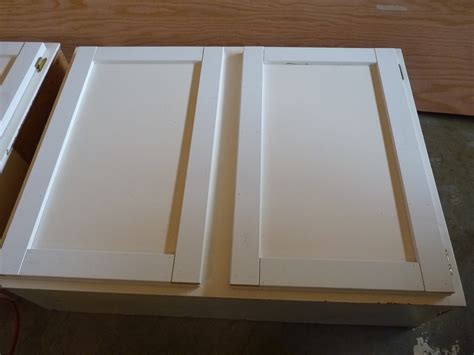 A shaker cabinet door is basically a flat panel door that is framed with a raised border. d i y d e s i g n: Upcycled Shaker-Panel Cabinet Doors