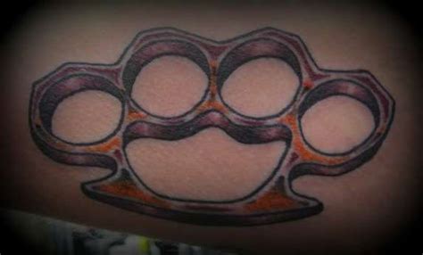 Brass Knuckles Tattoo