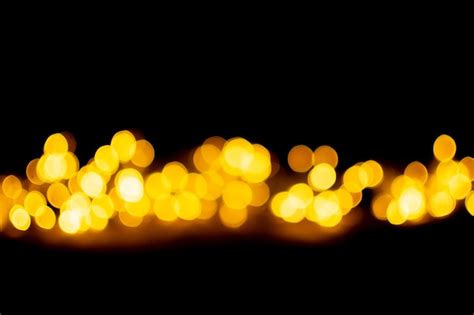 Premium Photo Bokeh Effect Golden Lights Black Background Sparkling