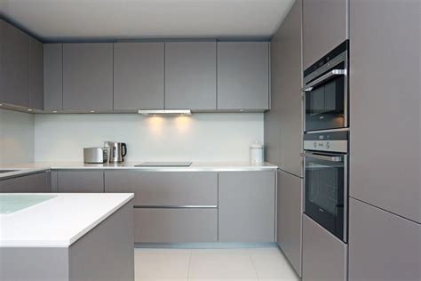 In fact, some people think that adding a gray finish is one of the best methods to add contrast and depth to a kitchen. Matt grey handleless kitchen #greykitchen in 2020 ...