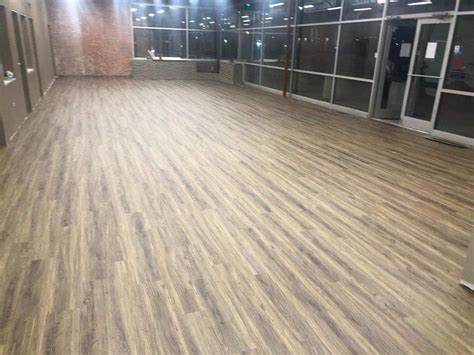 Commercial Luxury Vinyl Tile Flooring Eisel Roofing And Construction