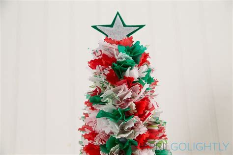 A Red White And Green Christmas Tree With A Star On Top