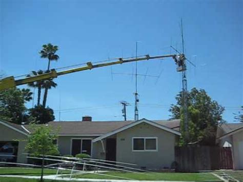 I did not want to wait 20 years for a tree to grow where i need one. Benny's ham radio antenna and tower work - YouTube