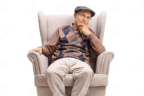 Elderly Man Sitting In An Armchair And Thinking Stock Photo Image Of