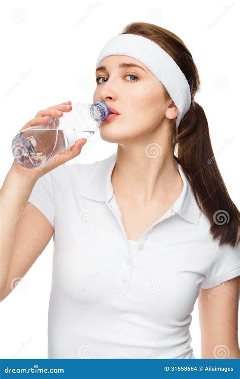 High Key Portrait Of Attractive Young Woman Drinking Water Isolated On