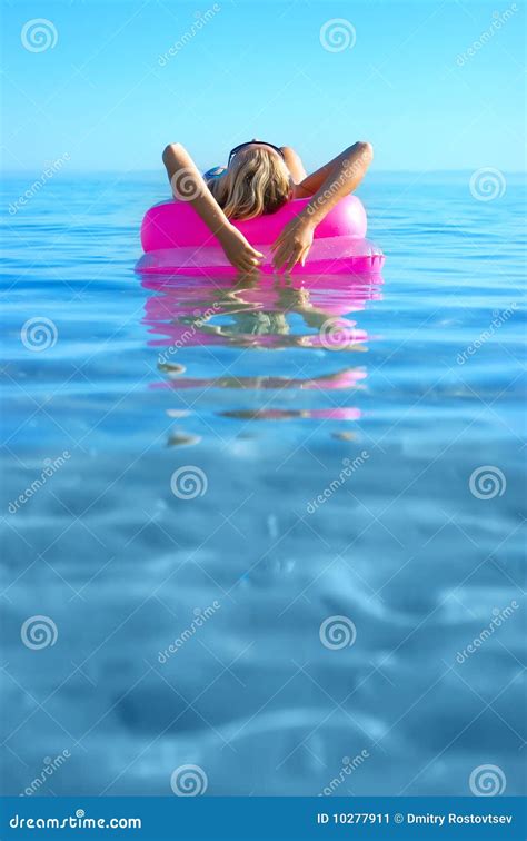 Blonde Girl On Inflatable Raft Stock Image Image Of Active Beach