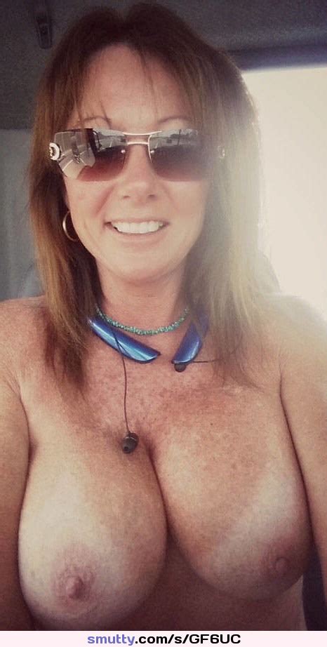 Brunette Milf Topless Freckled Tanlines Bignaturaltits Sunglasses Sexysmile Smutty