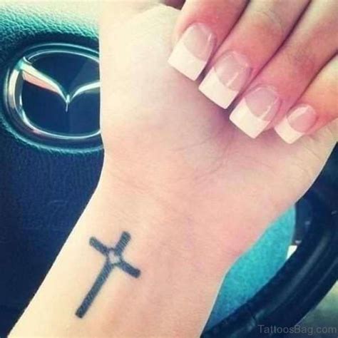 Tattoos on wrist designs, ideas and meaning the cross tattoos are related with christian faith and in addition with torturous killing. 60 Phenomenal Cross Tattoos On Wrist