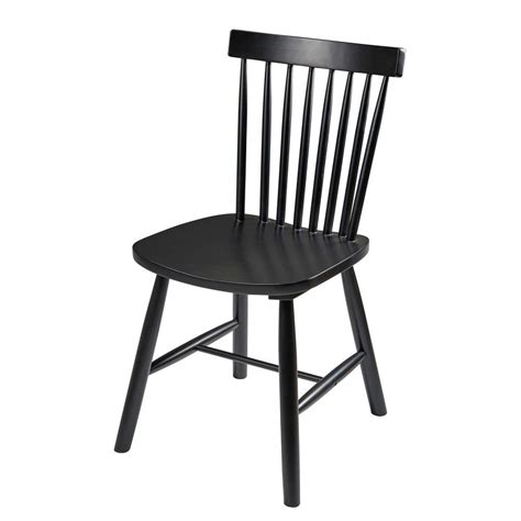 A Black Wooden Chair Against A White Background