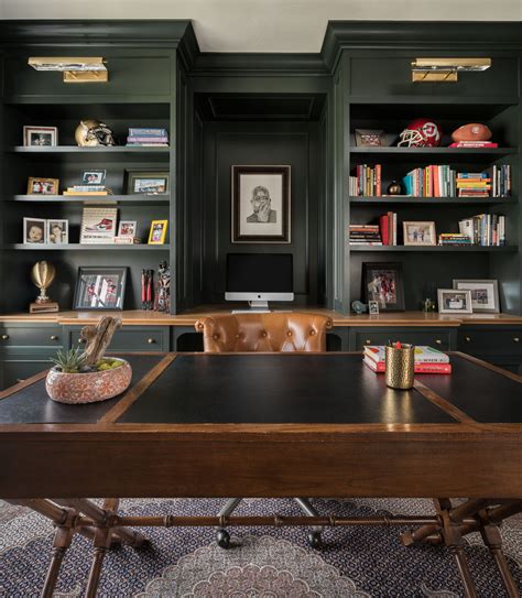 Dark Green Built In Bookshelf And Desk Gold Sconce Above Bookshelf