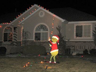 This being our first year, we are. Grinch pulling off the Christmas lights. Good way to do it ...