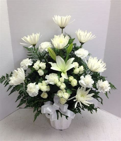 Many families list their preferences in the obituary or other public statement and include details about where to send flowers. Traditional and Unique White Funeral Arrangement by ...