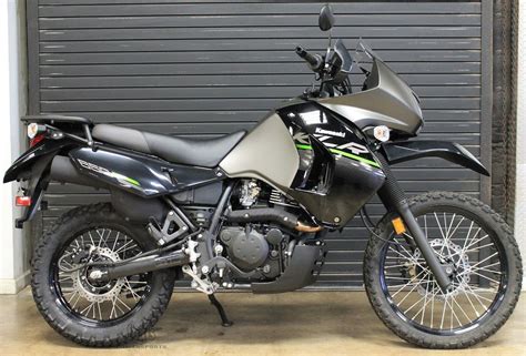 The standard model is now being offered in metallic spark black/metallic matte carbon gray and pearl solar yellow/metallic spark black. 2014 Kawasaki KLR 650 New Edition Dual Sport KLR650