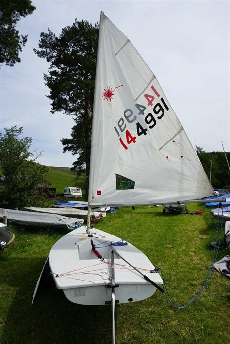 Laser Dinghy With Full Radial Rigs And Combi Road Base Trolley In