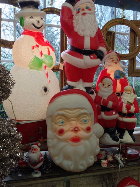 Vintage blow mold Christmas decorations. Santa is all lit-up for the ...